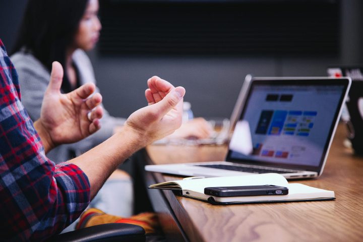 This is what marketers do. They open their laptop and pose for photos. Photo by Headway on Unsplash